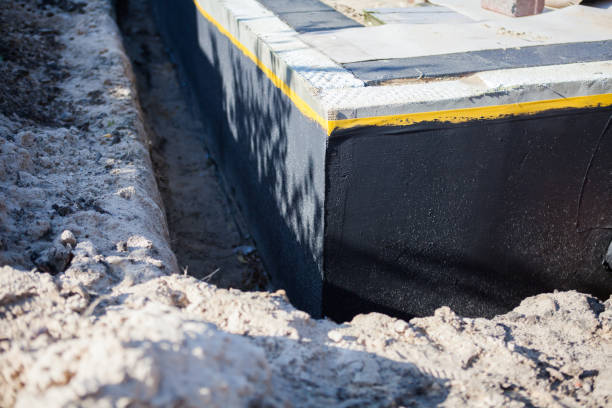 Professional Emergency Waterproofing technician working in Middlebury, IN